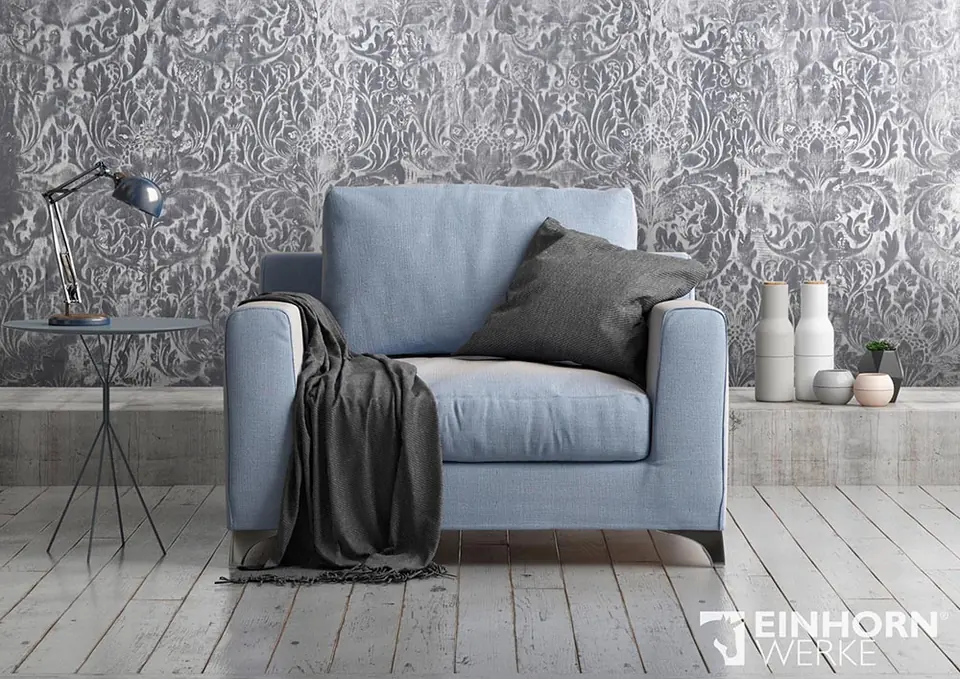 Sessel vor Stucco-Ornamentwand (Herstellerbild)