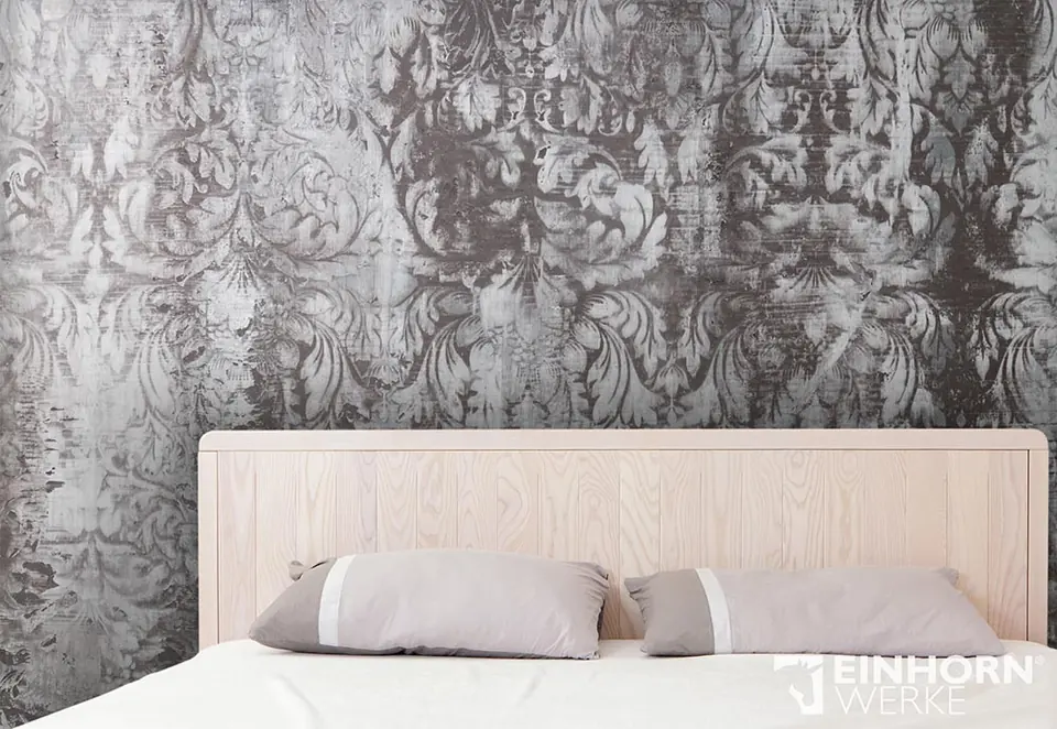 Schlafzimmer mit Stucco-Ornamentwand